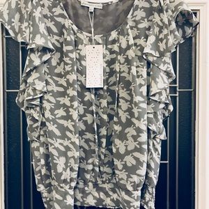 Cute blouse with ruffle design- NWT